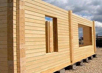 Привлекательность бруса в строительстве деревянных домов